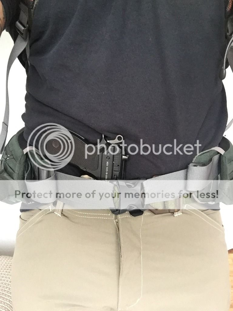 What to do with hand gun while backpacking?